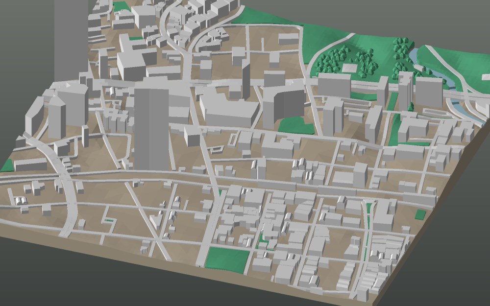 A 3D-printable model plate of Bogotá — La Candelaria — with its buildings, streets, water and terrain.