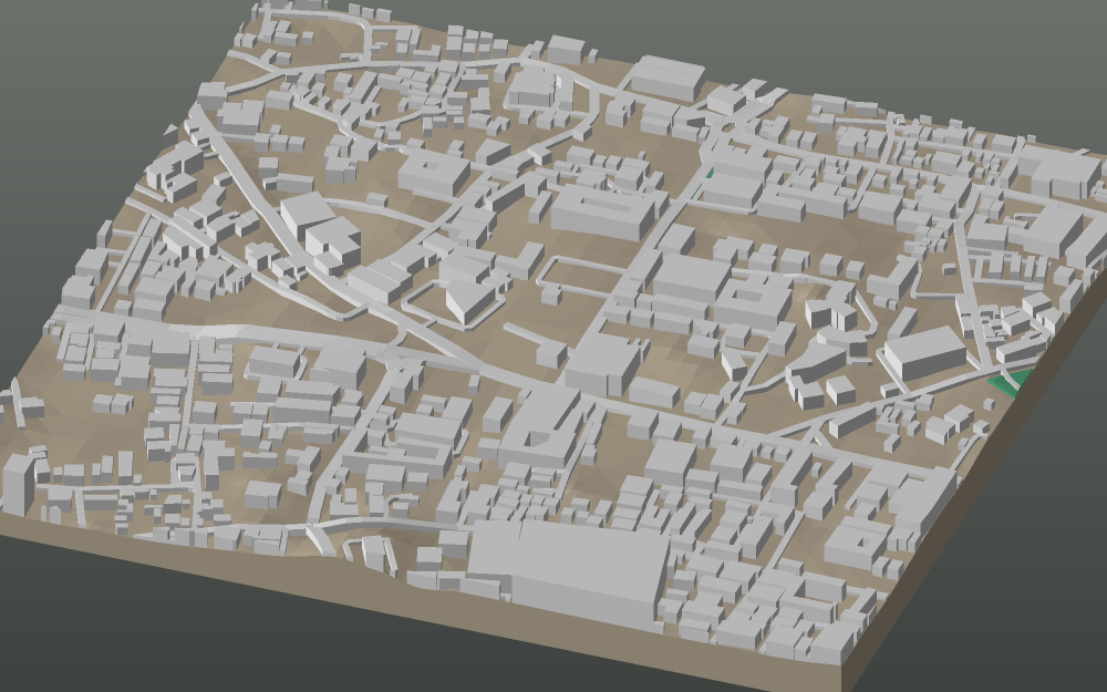 A 3D-printable model plate of Hyderabad — Abids — with its buildings, streets, water and terrain.